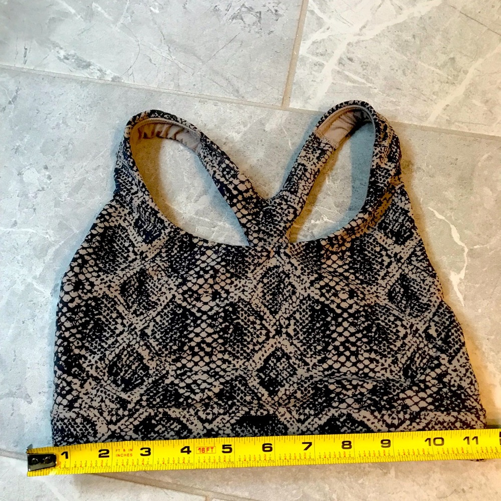 Athleta sports bra.  Beige and taupe color. Very good condition.  Size XS